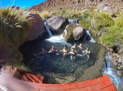 Group of friends in Puritama Hot Springs